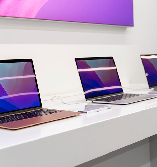 Laptop computers displayed on a countertop